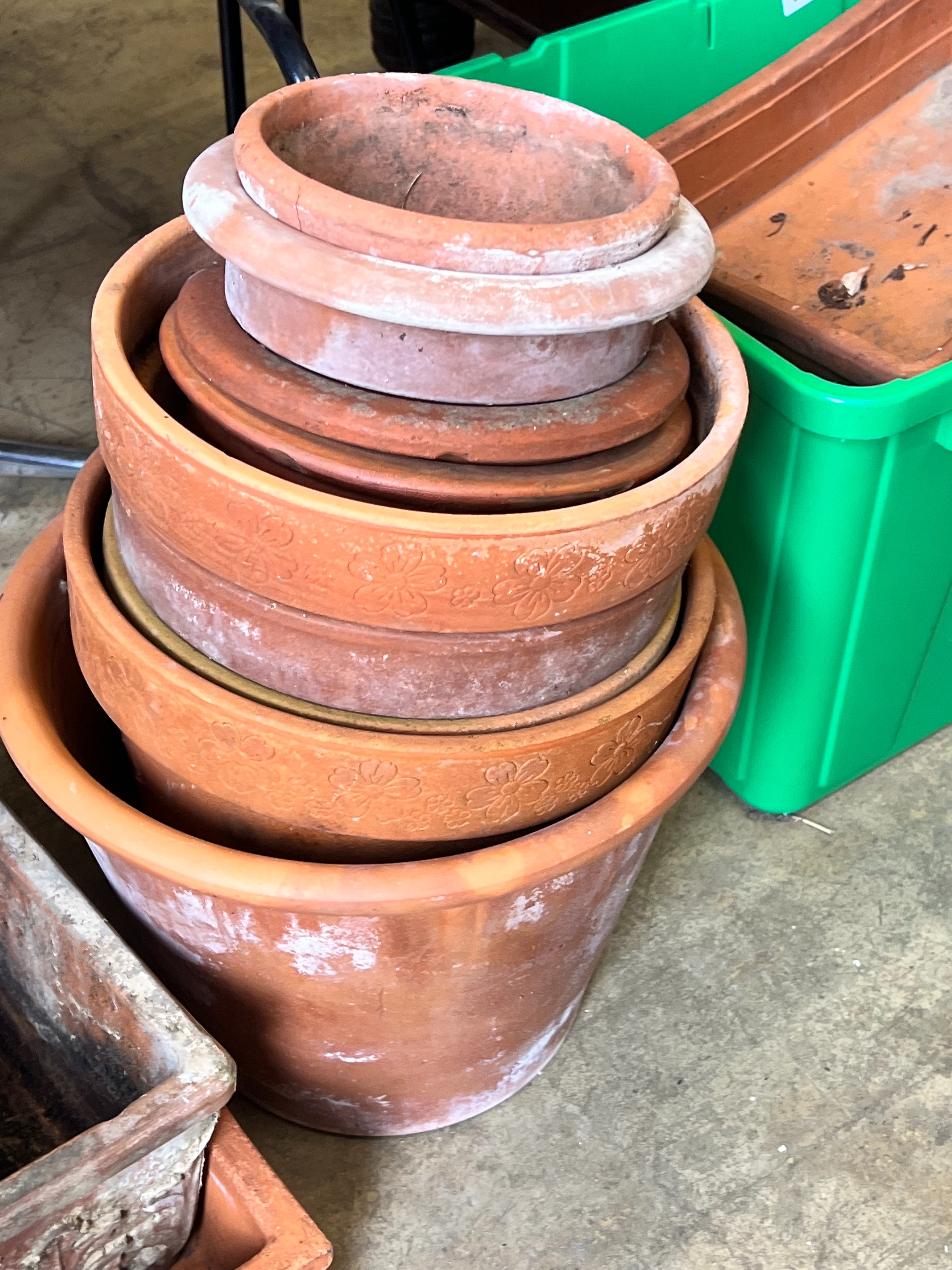 Approximately fifty assorted terracotta garden pots